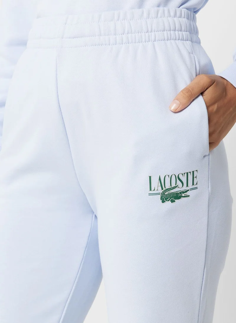 لاكوست بنطال جوغر بخصر مرتفع