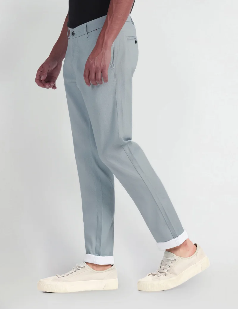 Arrow Blue Solid Smart Flex Trousers for Men | Best Price UAE