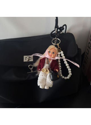M pink ribbon doll pendant