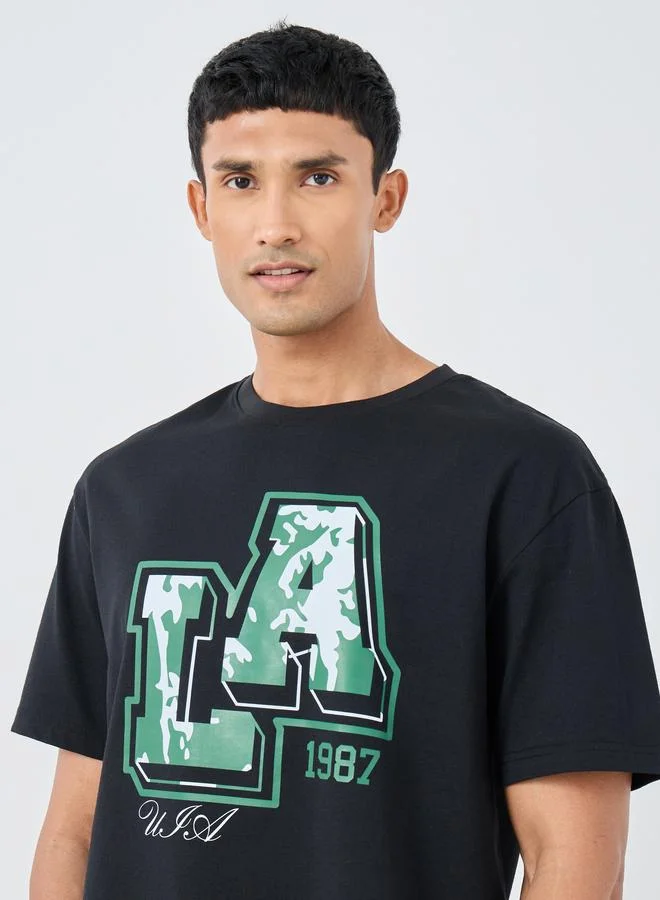 Styli Styli LA Graphic Print Crew Neck Oversized T-Shirt