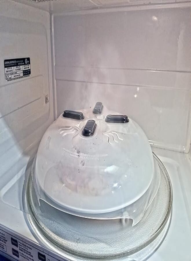 Microwave Hovering Anti Splattering Magnetic Food Lid Cover Guard - Microwave Splatter Lid with Steam Vents & Microwave Safe Magnets - Dishwasher Safe & Sticks To The Top Of Your Microwave