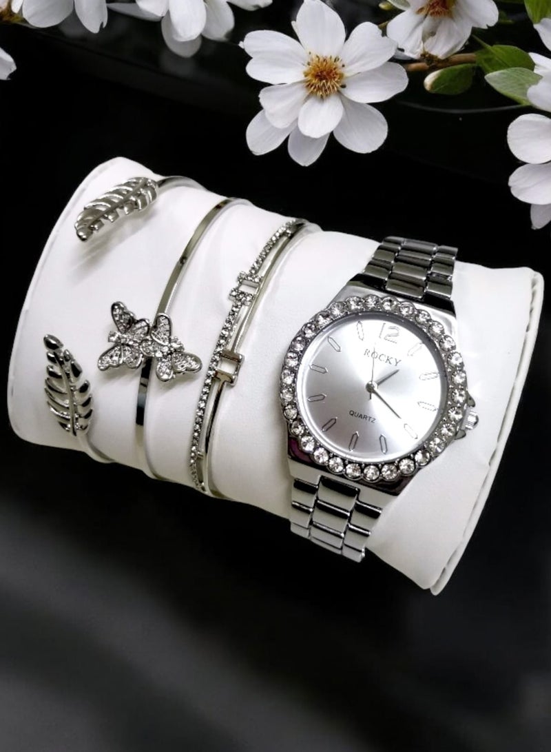 روكي طقم نسائي ماركة روكي يتكون من ساعة ومجموعة من الاساور من الستانلس ستيل - Image 1