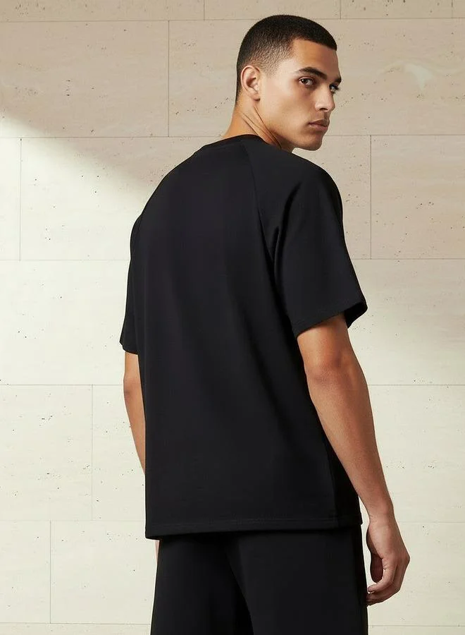 Love Pangolin Black Love Pangolin Men Raglan Sleeves Oversized T-shirt for Men | Best Price UAE