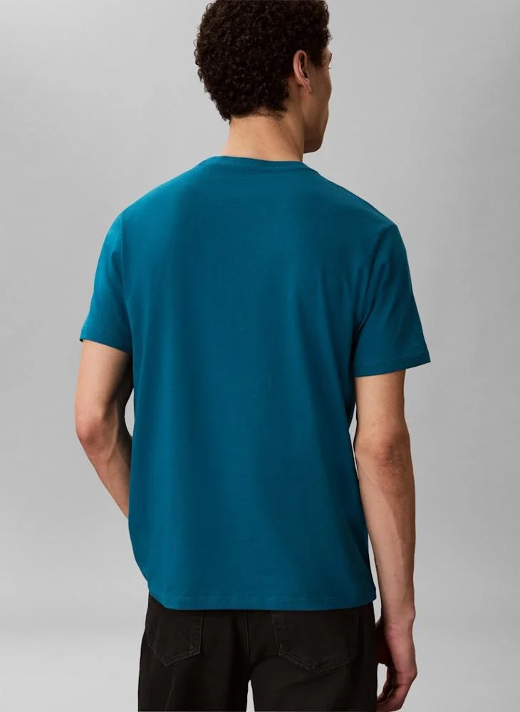 كالفن كلاين تيشيرت بياقة دائرية برسومات