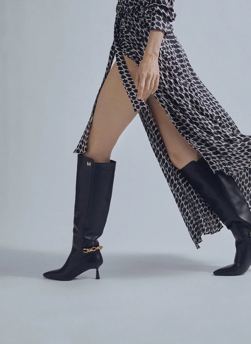 Lola Casademunt Knee-high leather boots with chain