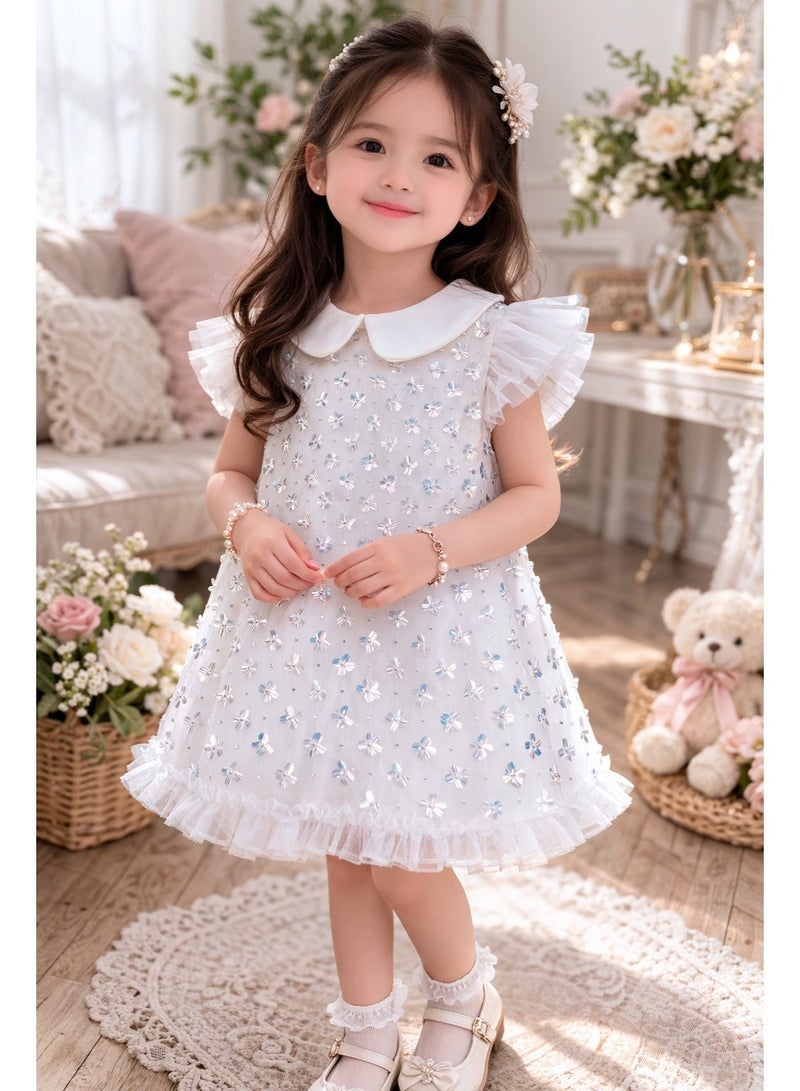 AE سمارتيز فستان أبيض أنيق للحفلات للبنات بياقة بيتر بان - فستان تول مزين بالترتر والزهور، مناسب للأعمار من 2 إلى 6 سنوات | زي مثالي لأعياد الميلاد وحفلات الزفاف والمناسبات الخاصة - Image 1
