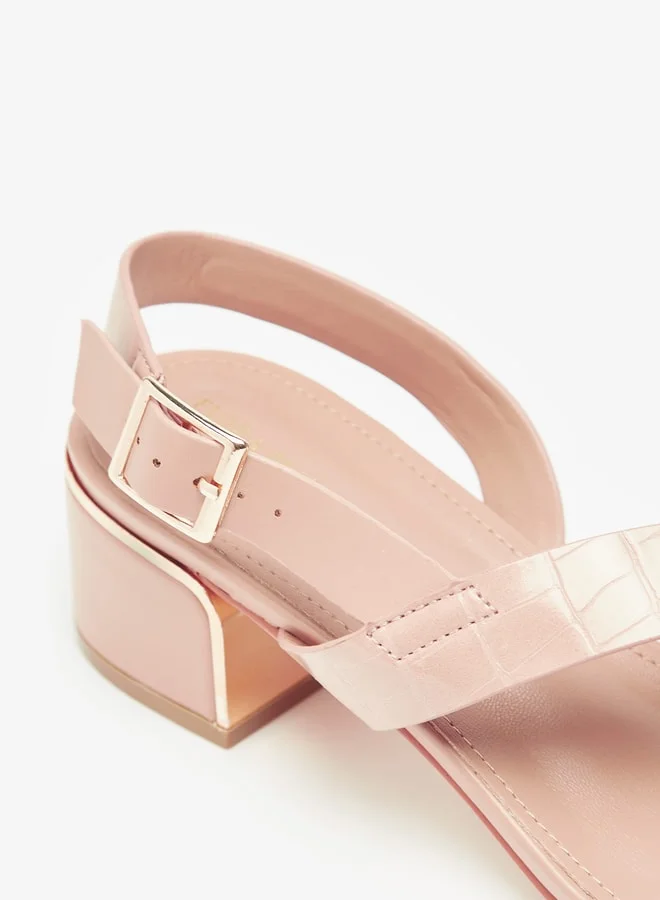 فلورا بيلا من شو إكسبرس Women Textured Sandals with Block Heels and Buckle Closure