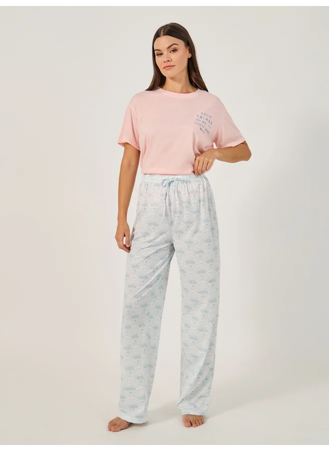 ستايلي Styli Unwind Printed Pajama Set with Round Neck T-Shirt