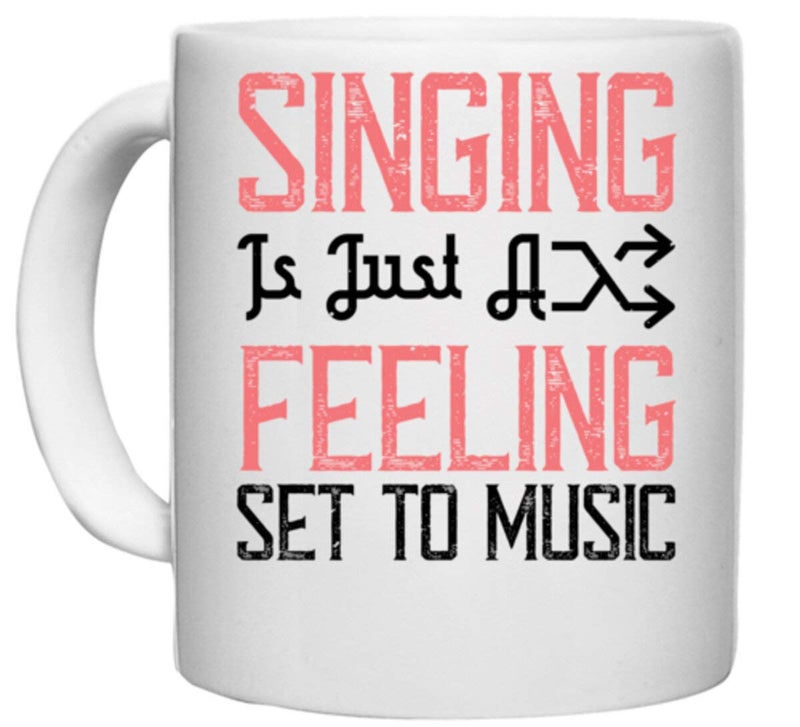 UDNAG White Ceramic Coffee/Tea Mug 'Music | Singing is just a Feeling Set to Music' Perfect for Gifting [330ml] - Image 1