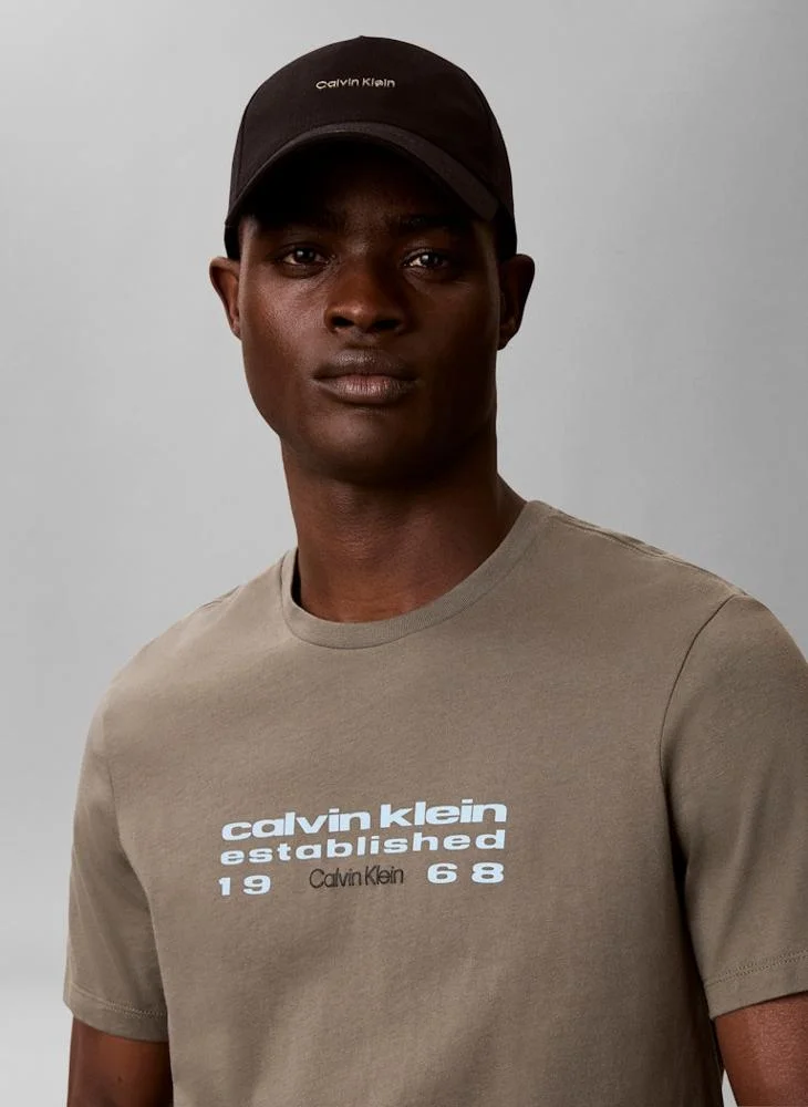 Calvin Klein Jeans Dusty Olive Logo Graphic Crew Neck T-Shirt for Men | Best Price UAE
