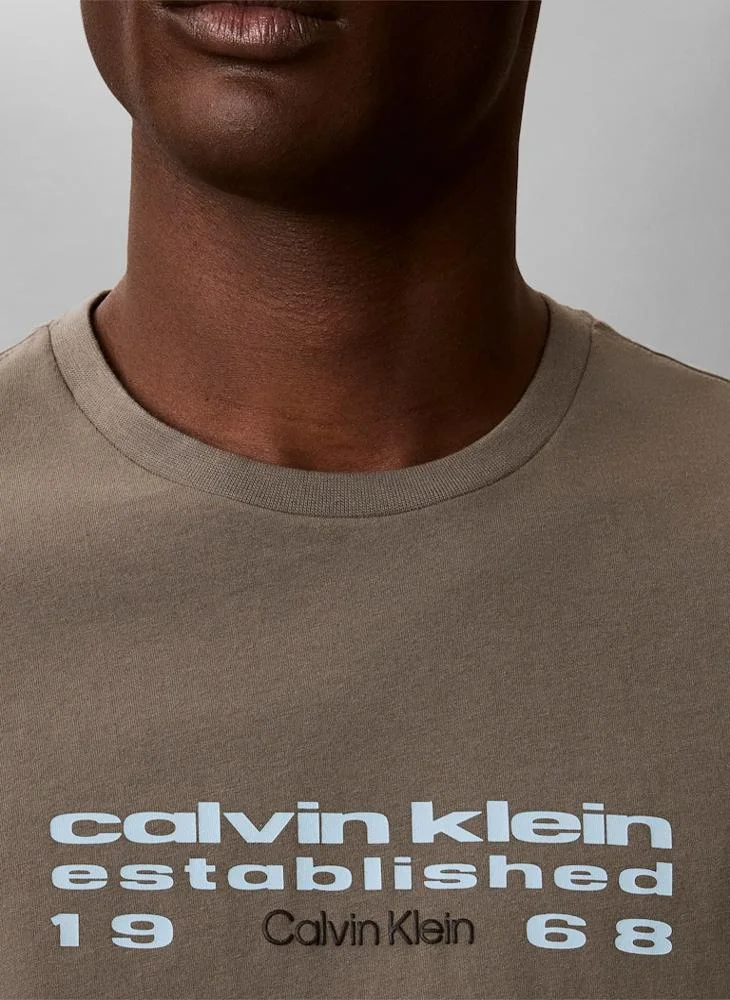 Calvin Klein Jeans Dusty Olive Logo Graphic Crew Neck T-Shirt for Men | Best Price UAE
