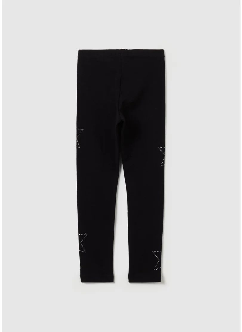 او في اس Leggings with stars and studs
