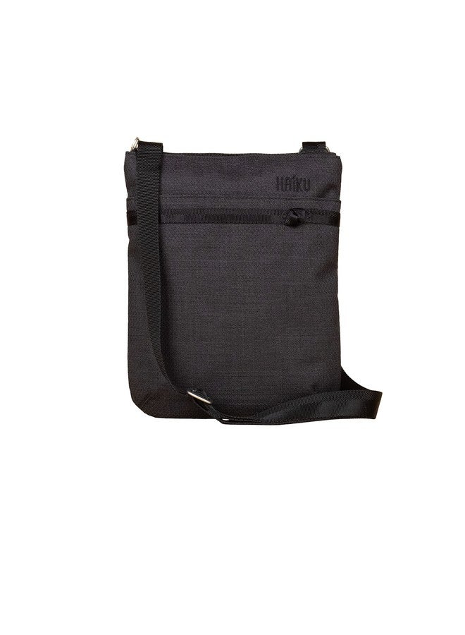 HAIKU Women's Small Revel Eco-Friendly RFID Blocking Crossbody Travel Bag, Black in Bloom - Image 1