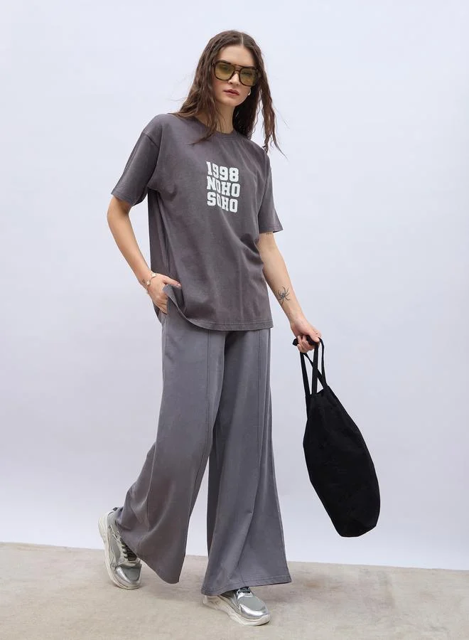 Styli Slogan Print Acid Washed Longline Oversized T-Shirt