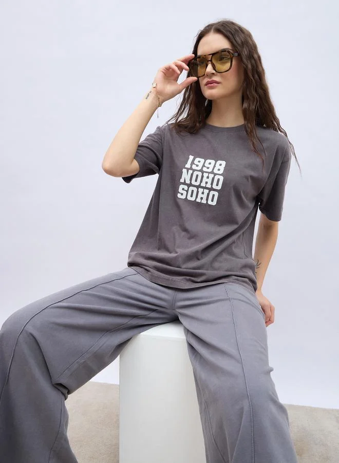 Styli Slogan Print Acid Washed Longline Oversized T-Shirt