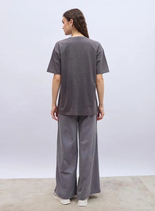 Styli Slogan Print Acid Washed Longline Oversized T-Shirt