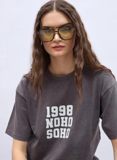 Styli Slogan Print Acid Washed Longline Oversized T-Shirt