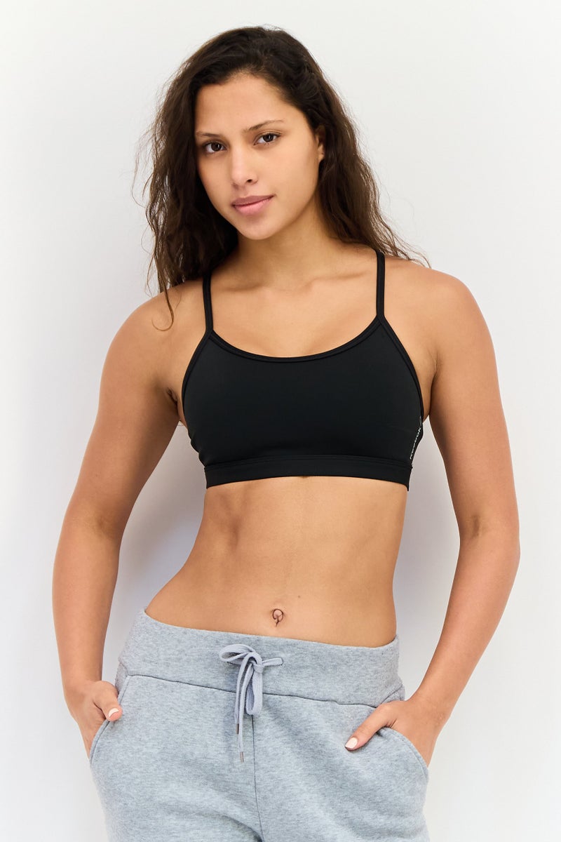 Reebok حمالة صدر رياضية نسائية بشعار العلامة التجارية، سوداء - Image 1