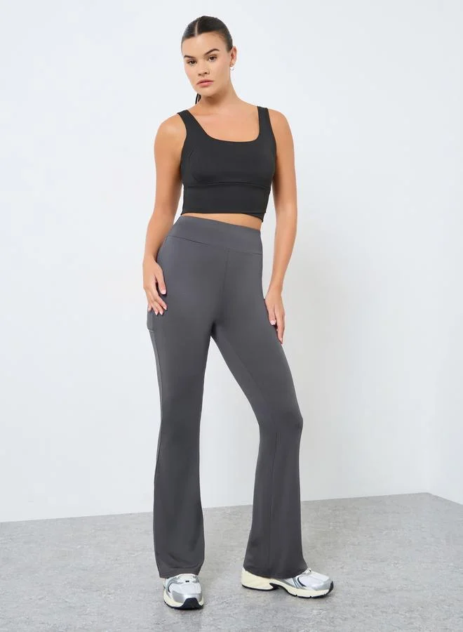 ستايلي اكتيف ليقنز واسع بأشرطة عاكسة مع تفاصيل جيب