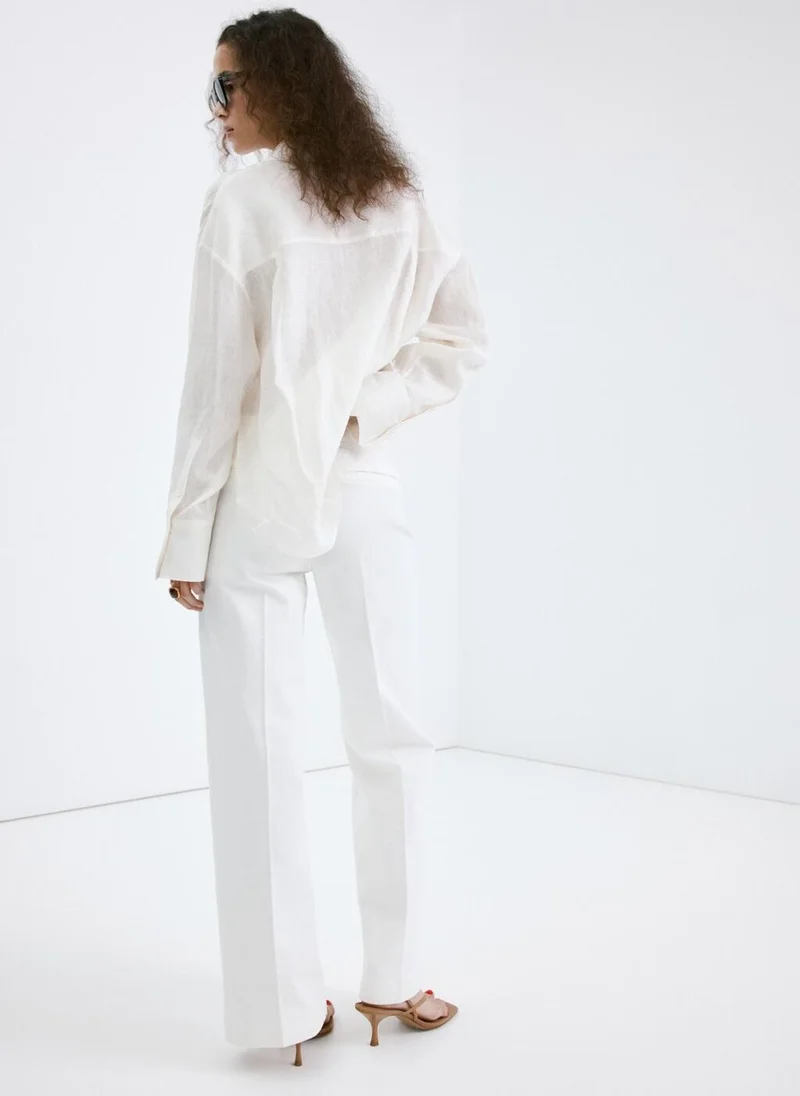 MANGO Wide-leg jeans with side buttons