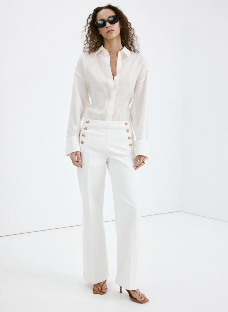 MANGO  Wide-leg jeans with side buttons for Women | Best Price UAE