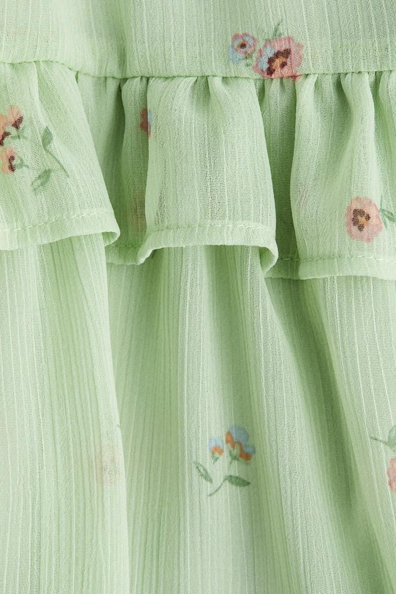 اتش اند ام فستان بحمالات كتف رفيعة وأطراف مكشكشة