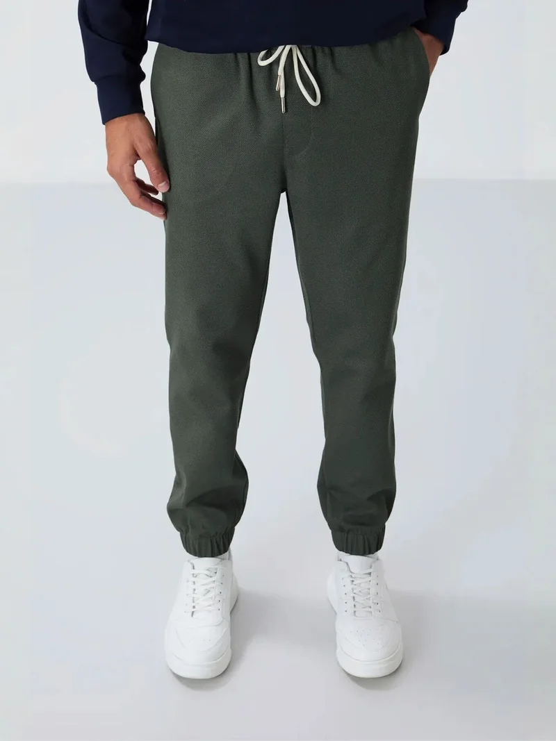 تومي لايف TOMMY Men's Regular Fit Fleece Sweatpants