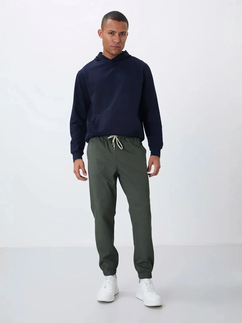 تومي لايف TOMMY Men's Regular Fit Fleece Sweatpants