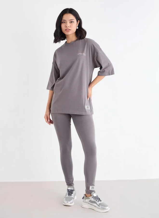 Styli Styli Oversized Slogan T-Shirt and Badge Detail Leggings Co-Ords