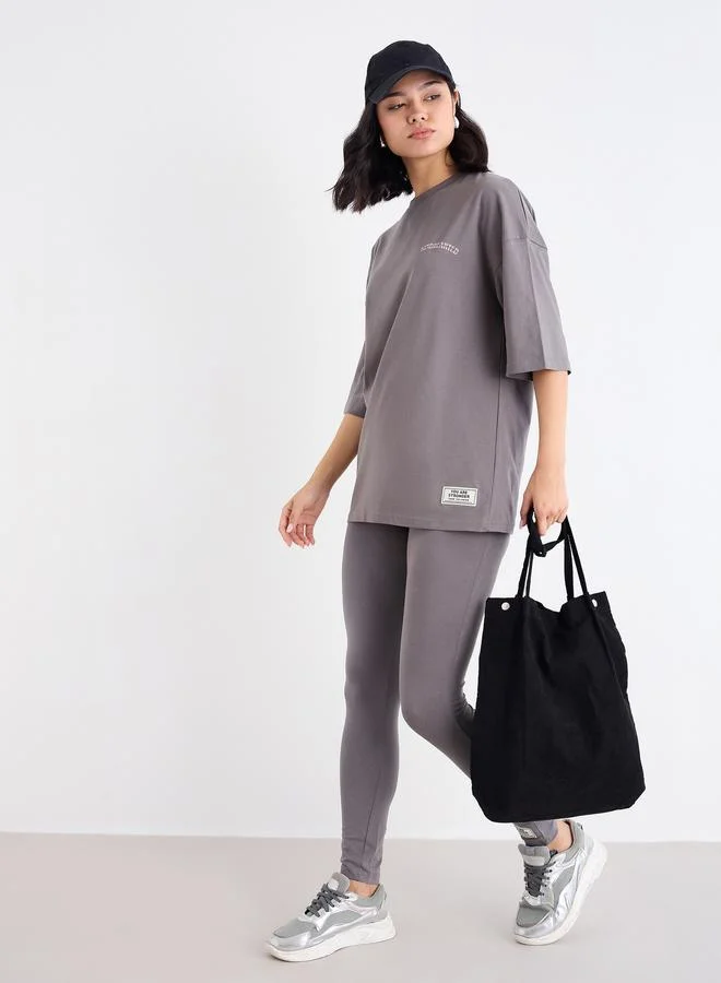Styli Styli Oversized Slogan T-Shirt and Badge Detail Leggings Co-Ords