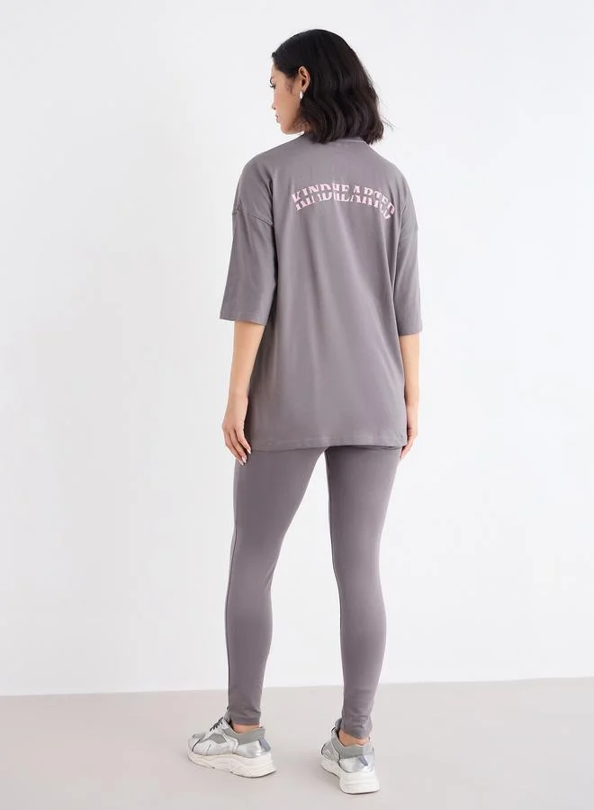 Styli  Styli Oversized Slogan T-Shirt and Badge Detail Leggings Co-Ords for Women | Best Price UAE