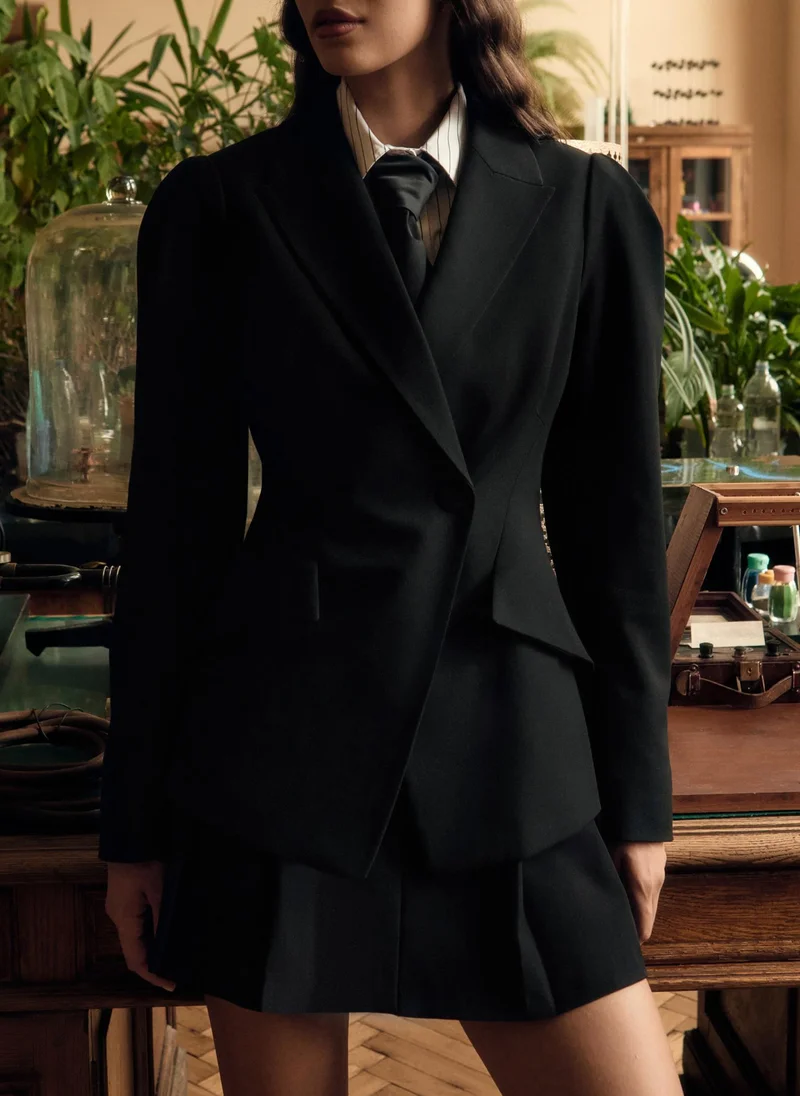 ليتشي سترة واسعة بأكمام واسعة