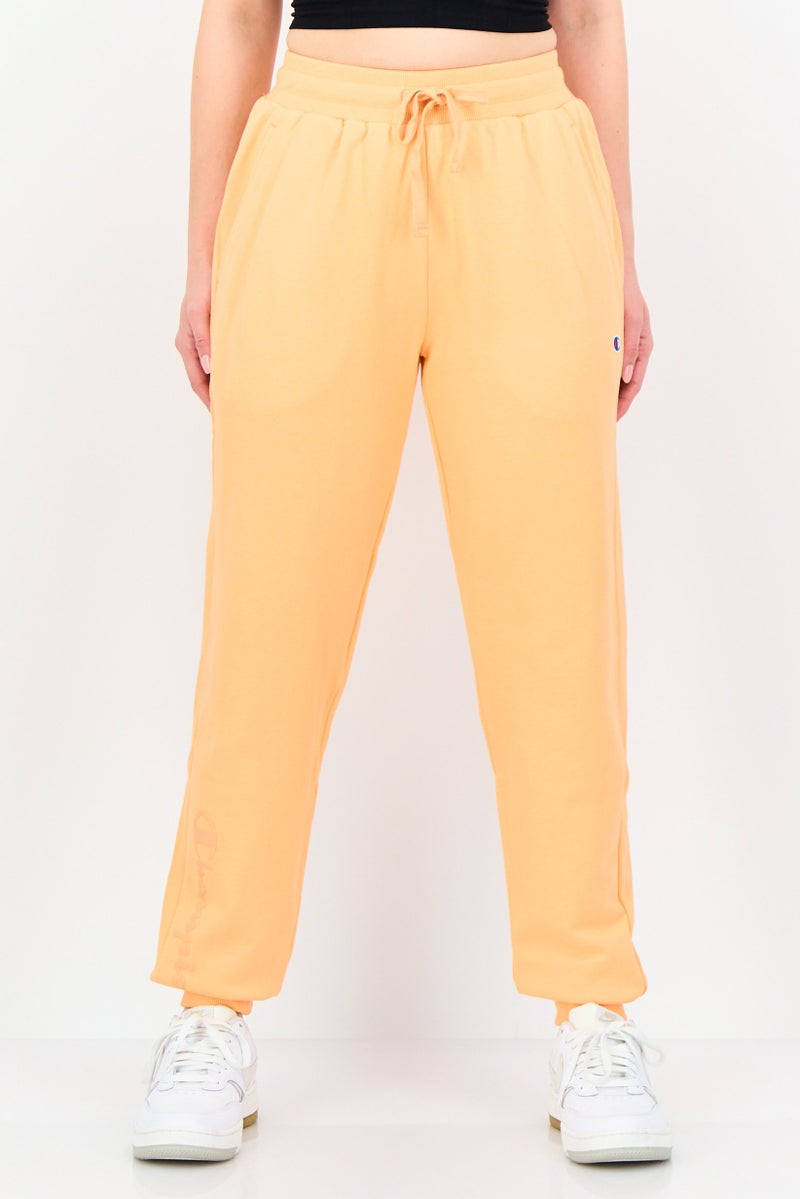 Champion Women Sportswear Fit Outdoor Sweatpants, Orange - Image 1