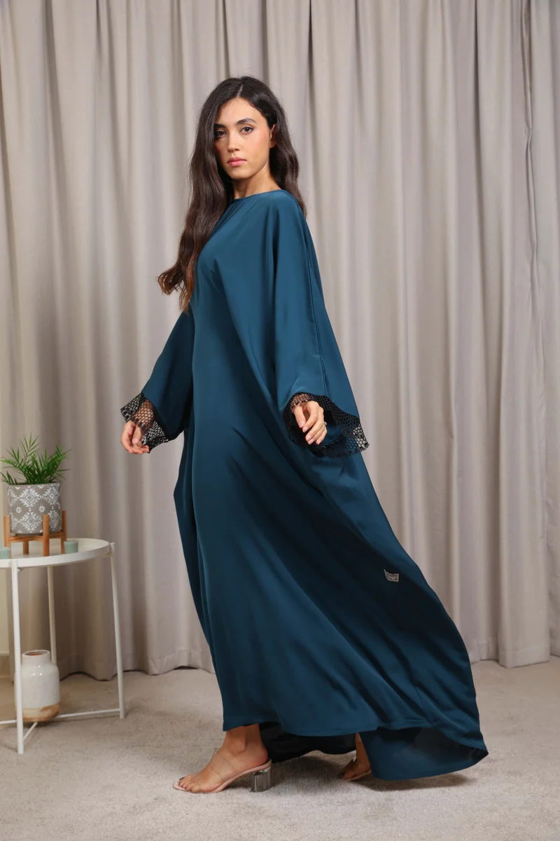 Nikias  Nikias Turquoise Nida Butterfly Abaya – Elegant Flowing Design for Women | Best Price UAE