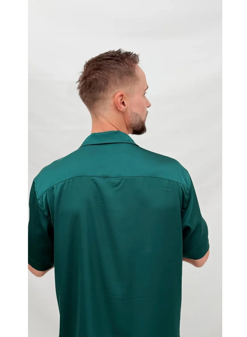 جانارا جونز قميص ساتان لندن باللون الأخضر المزرق