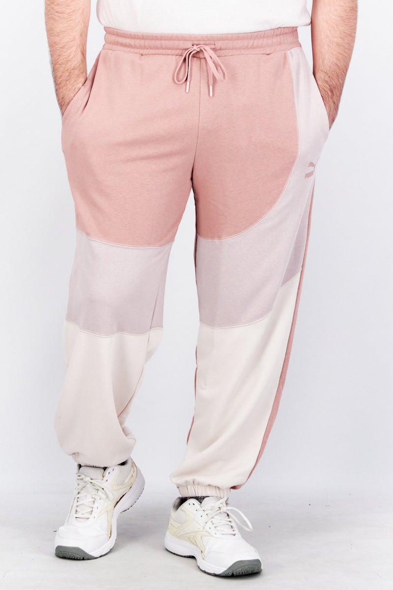 PUMA سروال رياضي للرجال مناسب لنقل الهواء في الهواء الطلق، وردي قديم - Image 1