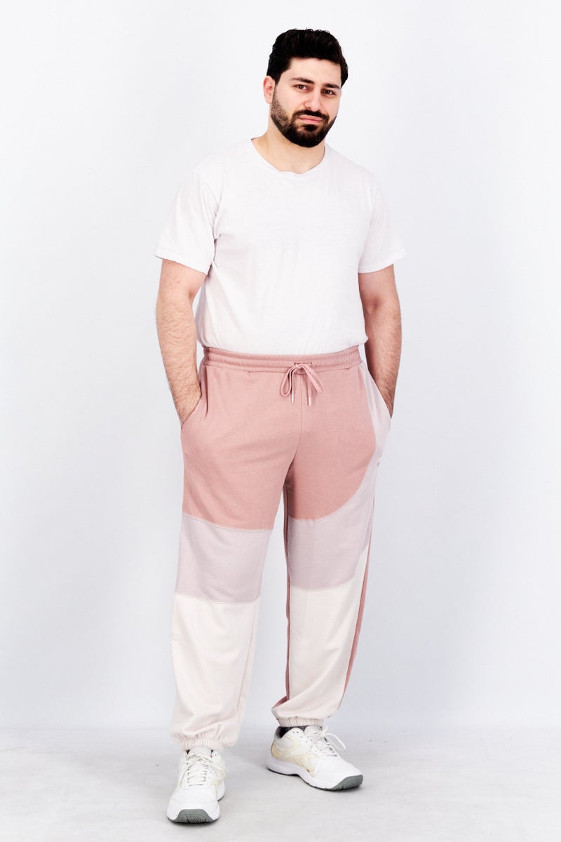 PUMA سروال رياضي للرجال مناسب لنقل الهواء في الهواء الطلق، وردي قديم - Image 3