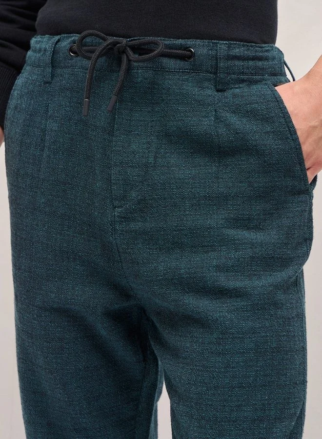 The Bear House  Men's Teal Self Design Tapered Fit Elasticated Waist Casual Trouser Versatile Office and Travel Pants Comfortable Fit for Everyday Use Easy to Style Bottomwear for Work Weekend and Outings for Men | Best Price UAE
