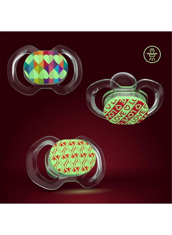 سمايلو لهاية سميلو بيبي - عبوة من 3 لهايات رفيعة للأطفال - المرحلة 3 للأطفال من عمر 9 أشهر فما فوق - لهاية مصنوعة من السيليكون بنسبة 100% وخالية من مادة BPA - تتوهج في الظلام - إصدار عيد الحب - Image 1