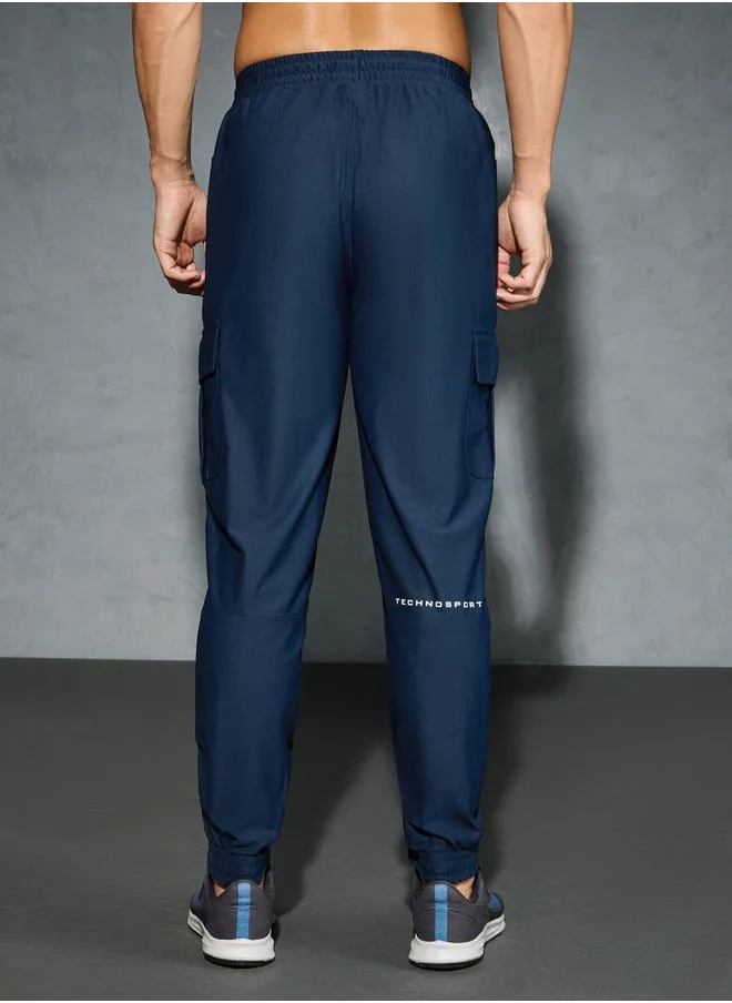 تكنوسبورت Solid 4-Way Stretch Cargo Pants by Styli