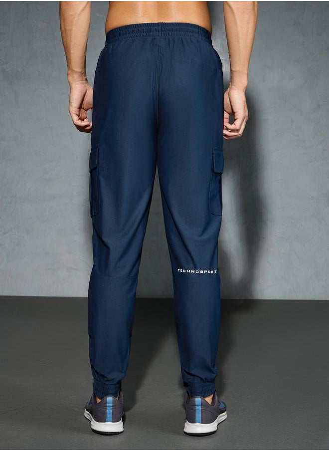 Technosport - Solid 4-Way Stretch Cargo Pants by Styli - Image 1