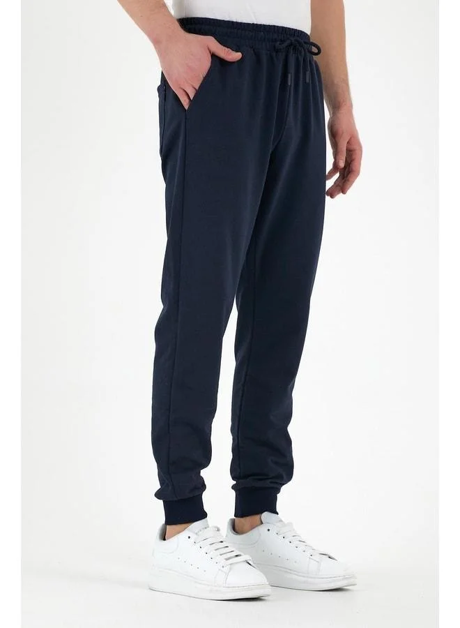 Mmetalic  Navy Blue Men's Sweatpants with Label and Back and Side Pockets, Regular Fit for Men | Best Price UAE