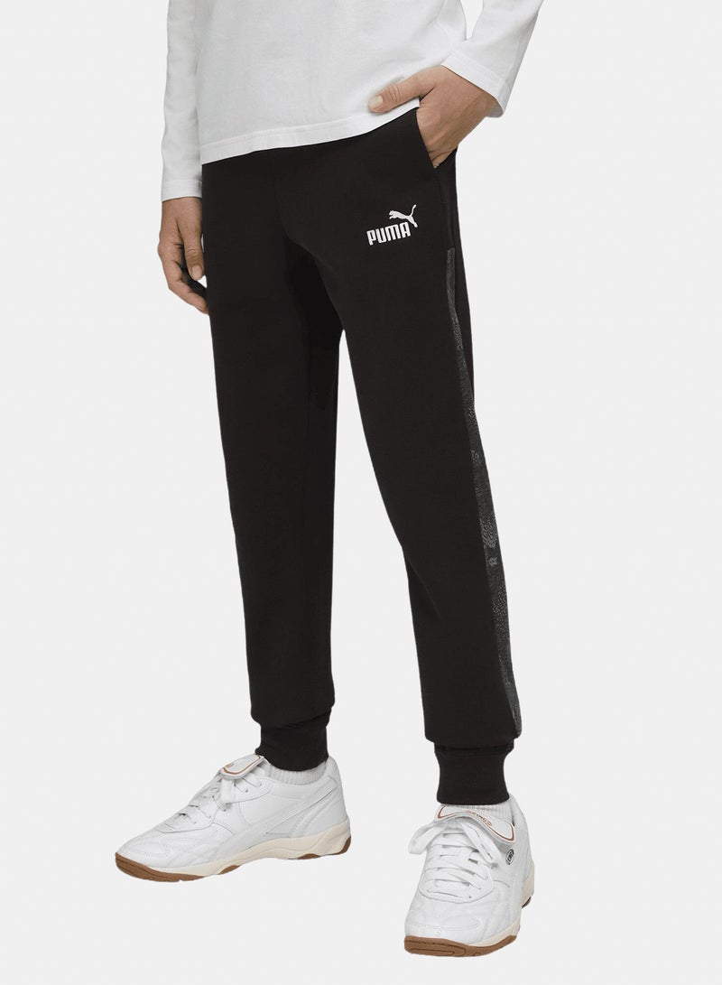 PUMA ESS CAMO Sweatpants - Image 1
