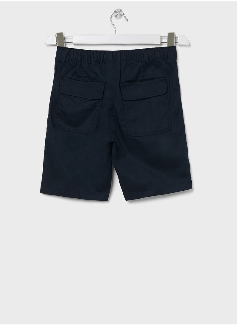 TOMMY HILFIGER - TAPE REGULAR CHINO SHORT - Image 1