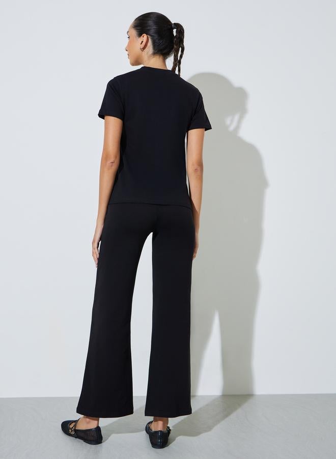 Styli Black Cotton Text Print T-Shirt and Flared Leggings Co-Ord Set - Image 3