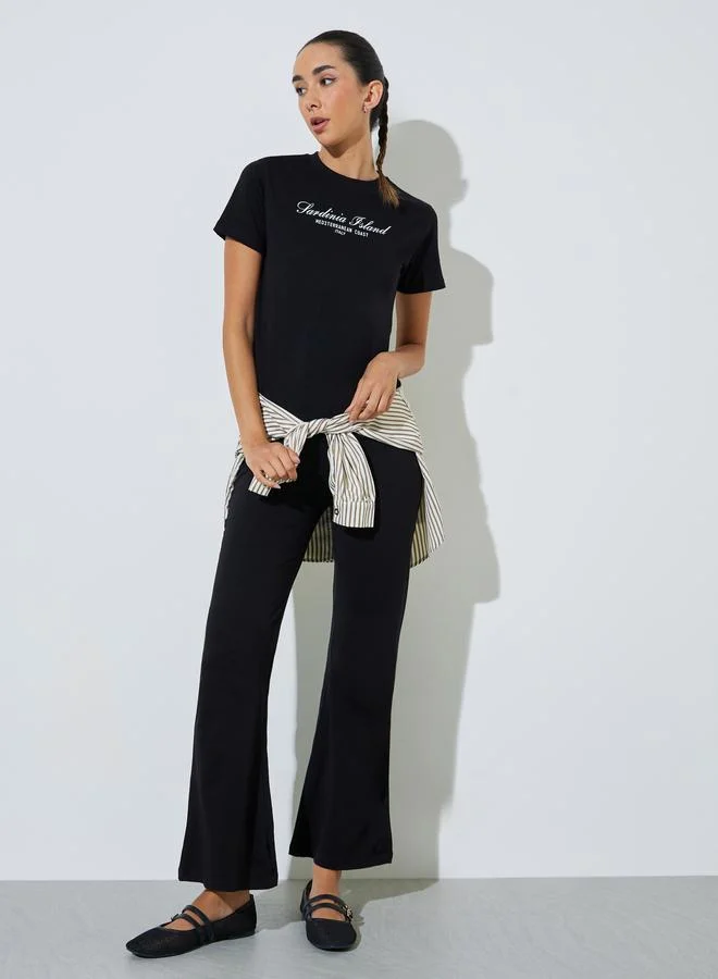 Styli Black Cotton Text Print T-Shirt And Flared Leggings Co-Ord Set