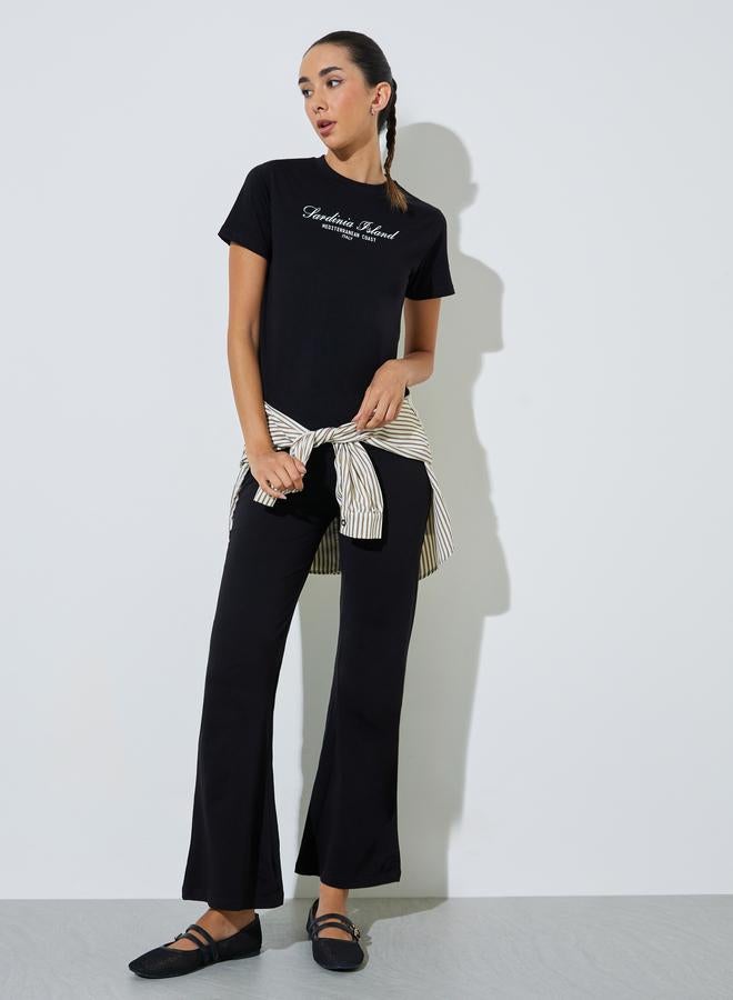 Styli Black Cotton Text Print T-Shirt and Flared Leggings Co-Ord Set - Image 1