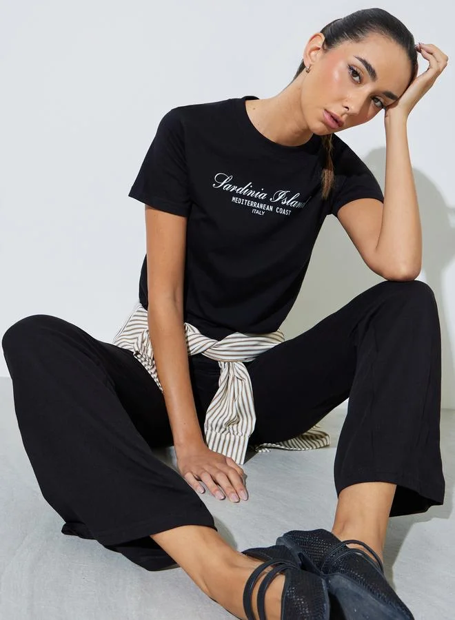 Styli Black Cotton Text Print T-Shirt And Flared Leggings Co-Ord Set