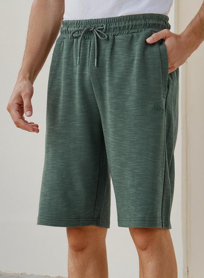 كابا شورت كابا بقصة عادية مع رباط وجيوب - Image 1