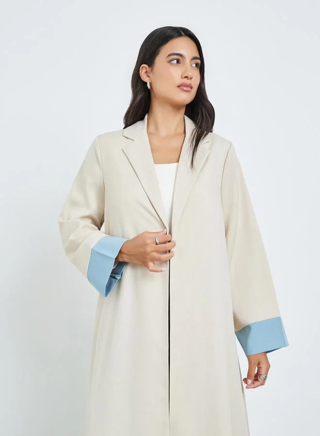 أميرة عباية بحافة واسعة ونمط كتل الالوان